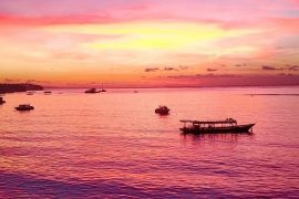 A sunset over a Bali beach